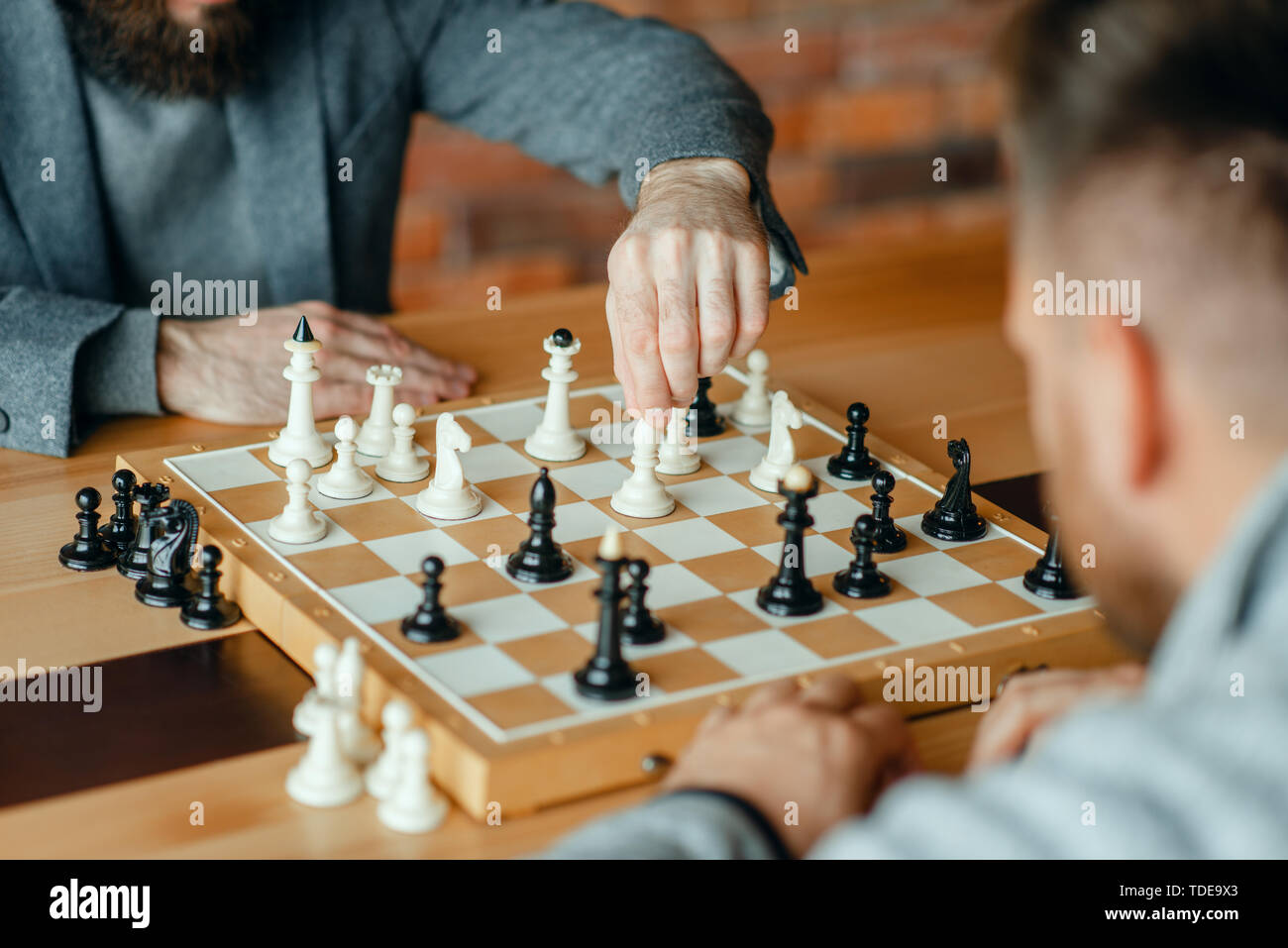 Male chess players playing, thinking process Stock Photo Alamy
