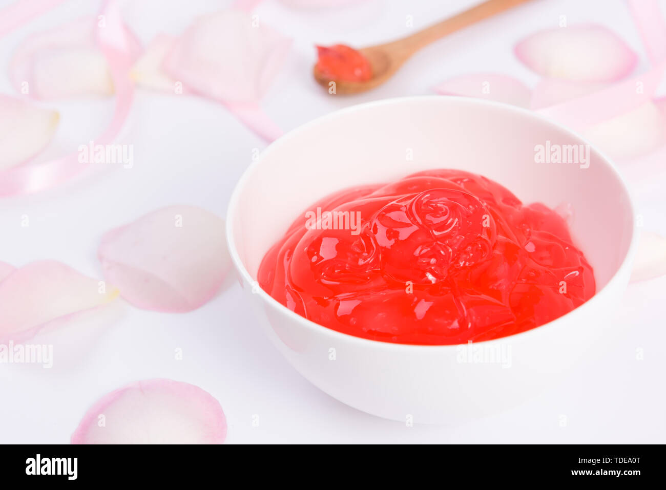 Pink rose petals and skin care lotions Stock Photo Alamy