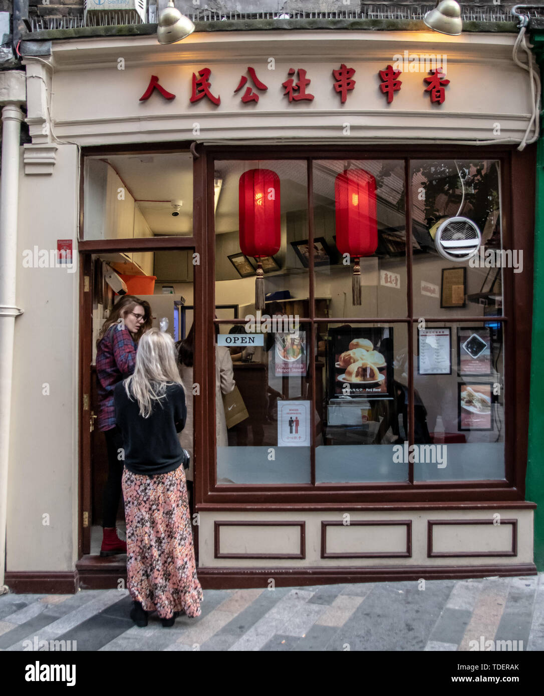 London, UK. London, UK. Tourists enjoy London Chinatown Sweet Tooth Cafe and Restaurant at Newport Court and Garret Street on 15 June 2019, UK. Credit: Picture Capital/Alamy Live News Credit: Picture Capital/Alamy Live News Stock Photo