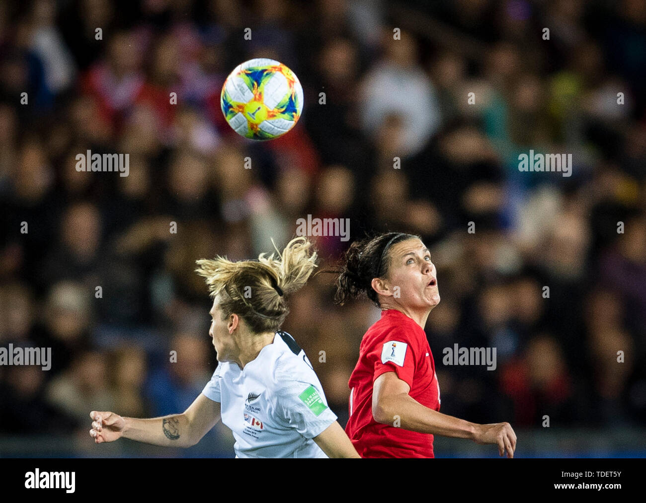 Grenoble, France. 15th June, 2019. Rebekah Stott (L) of New Zealand vies with Christine Sinclair of Canada during the group E match between Canada and New Zealand at the 2019 FIFA Women's World Cup in Grenoble, France on June 15, 2019. Canada won 2-0. Credit: Xiao Yijiu/Xinhua/Alamy Live News Stock Photo