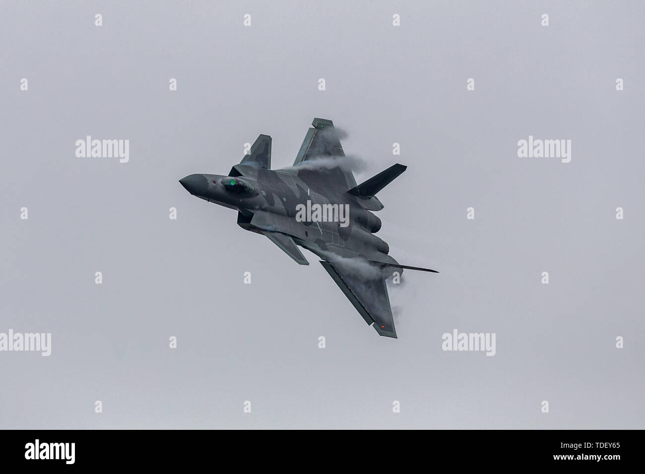The two-aircraft formation of a new generation of fighter jets J-20 independently developed in China performs a flight performance in Zhuhai, Guangdong, November 10, 2018. Stock Photo
