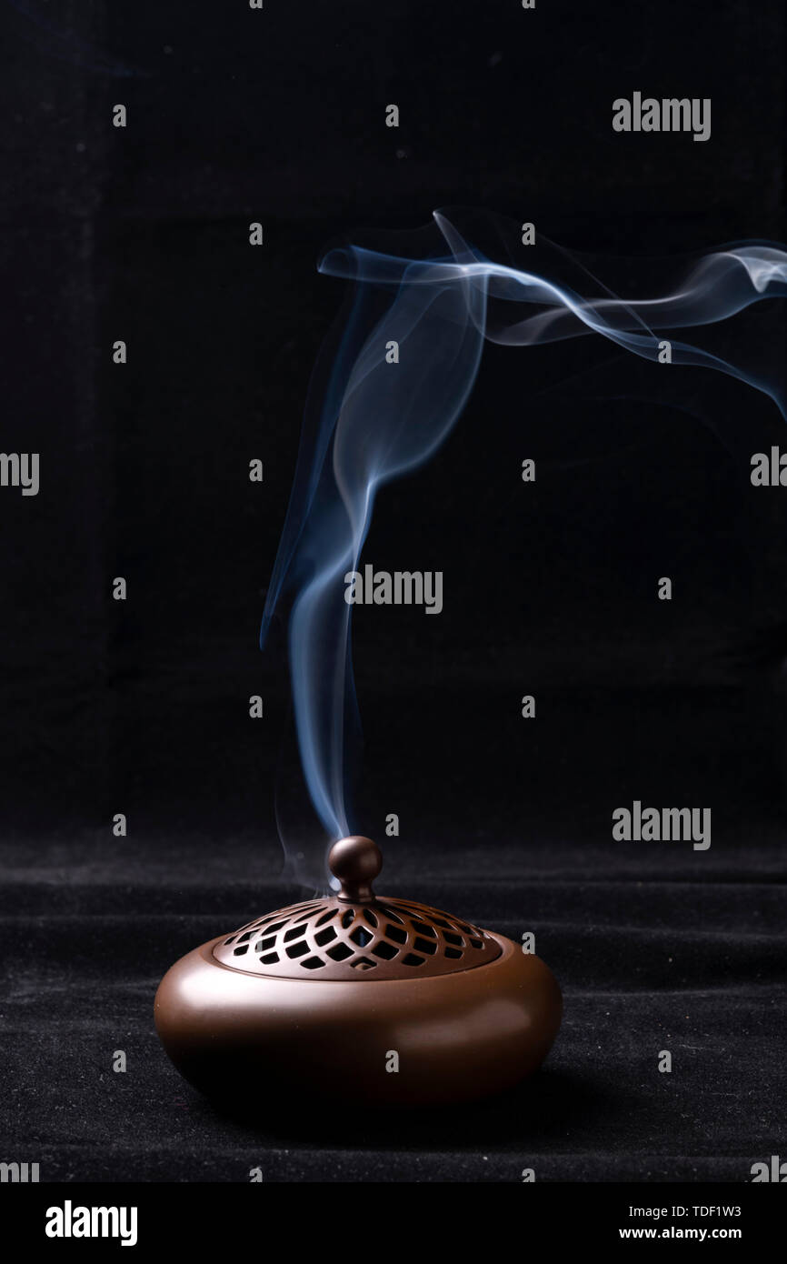 Copper incense stove Stock Photo Alamy