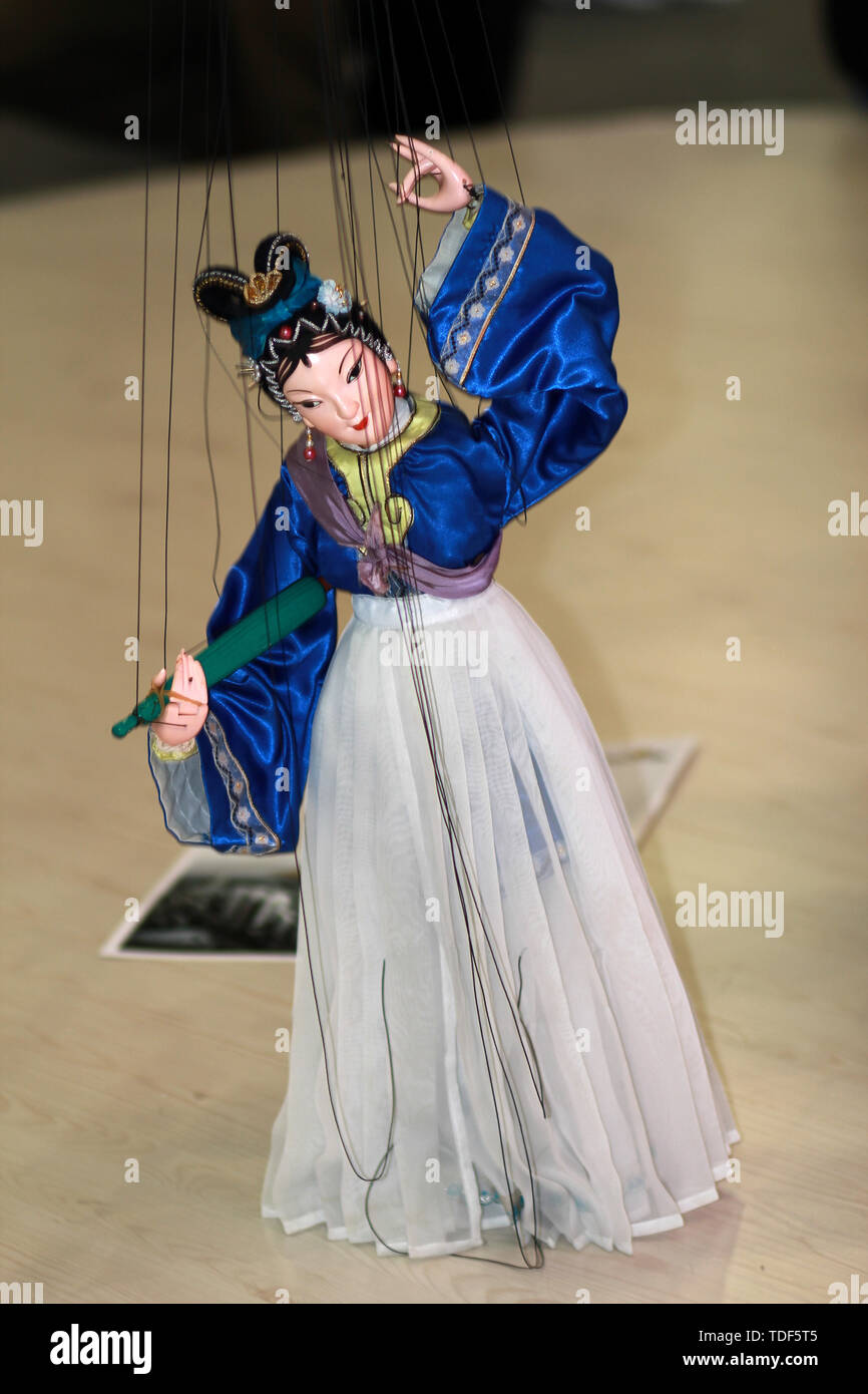 Old entertainer performs wire puppets Stock Photo Alamy