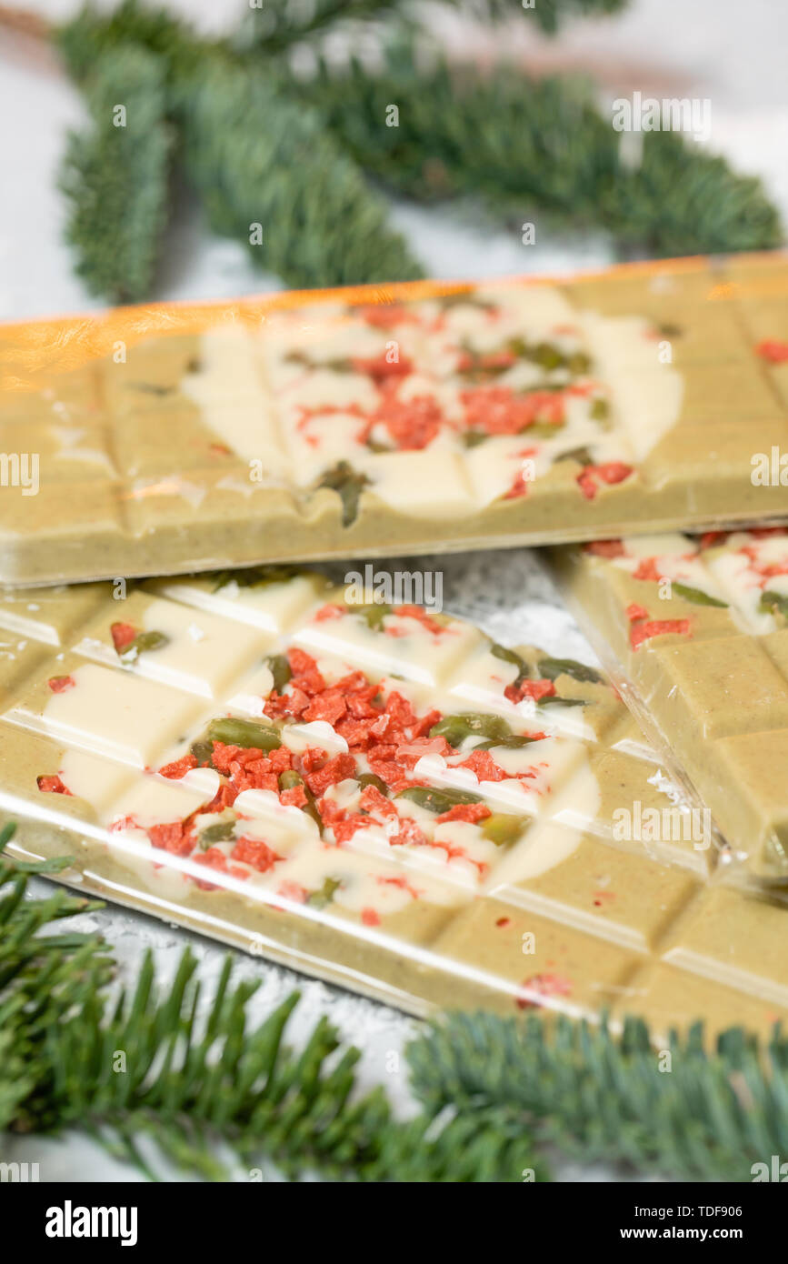 Handmade chocolates bar. Christmas theme. White chocolate bar with