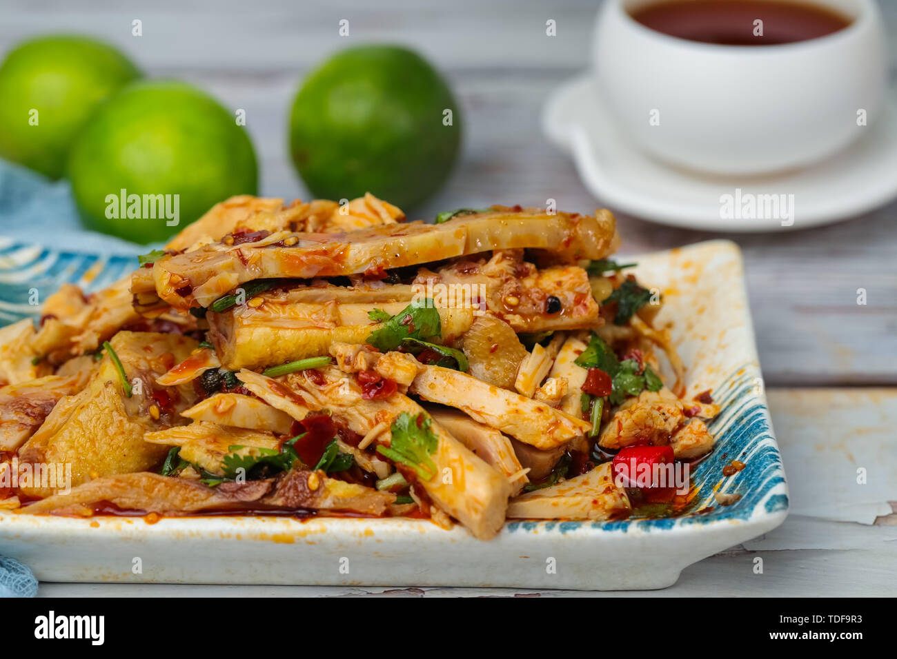 drooling chicken, stick chicken Stock Photo - Alamy