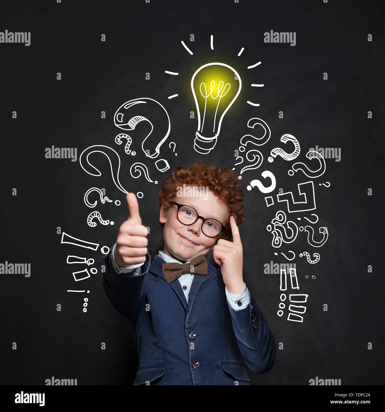https://c8.alamy.com/comp/TDFC24/smart-kid-student-and-lightbulb-on-blackboard-background-happy-child-showing-thumb-up-brainstorming-and-idea-concept-TDFC24.jpg