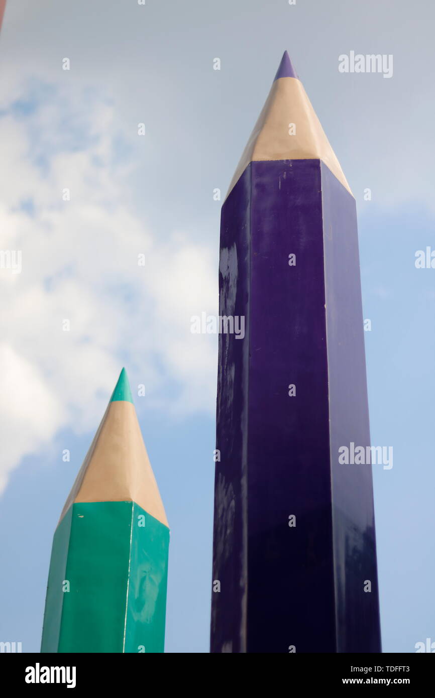 Blue sky pencil crayon building Stock Photo Alamy
