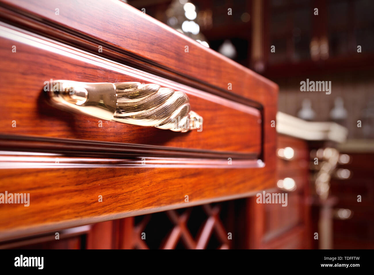 wooden cupboard with opened empty drawer Stock Photo