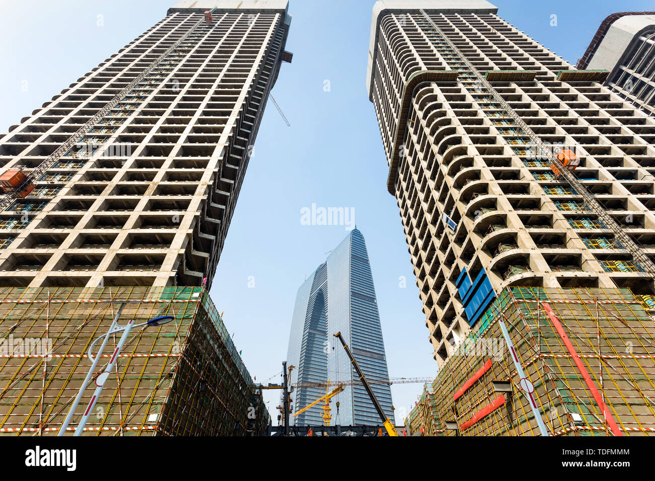 skyscraper under construction in modern city Stock Photo - Alamy