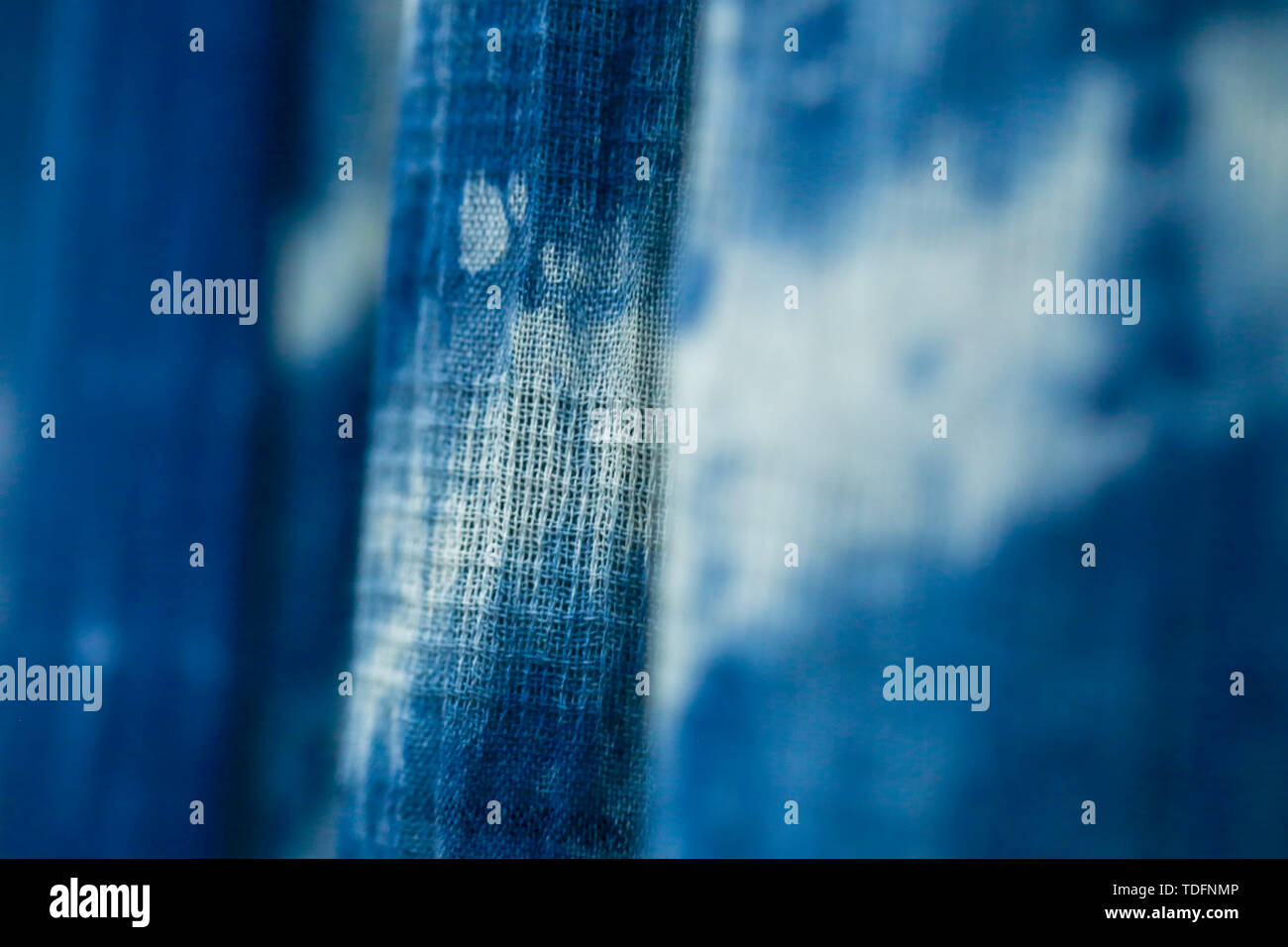 Batik braid glowing dots abstract background Stock Photo