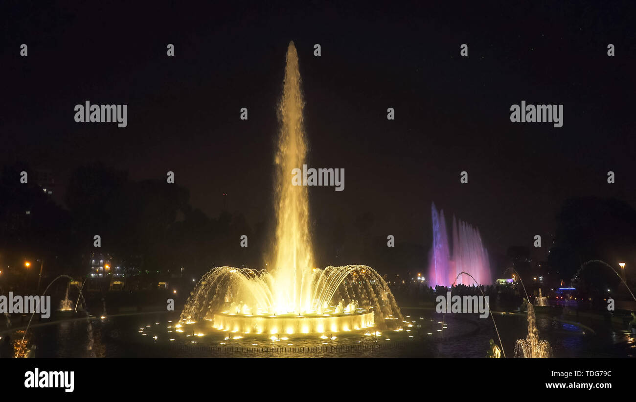 wide angle night shot of the magic fountain at park of the reserve in lima , peru Stock Photo