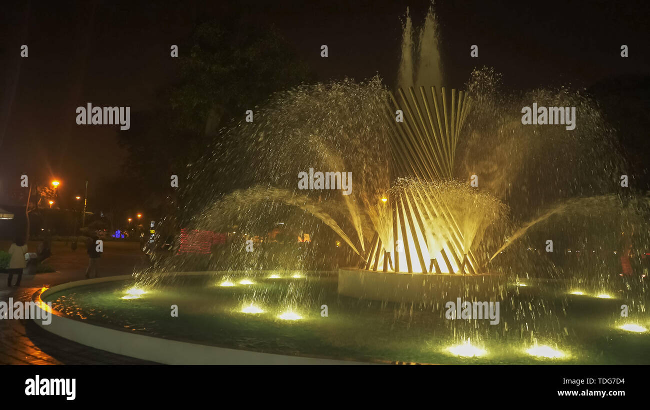 night time shot of the fountain of life in lima, peru Stock Photo