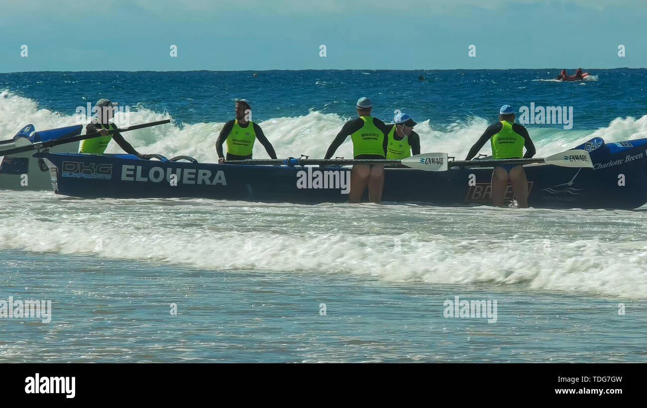 ALEXANDRA HEADLAND, QUEENSLAND, AUSTRALIA- APRIL 21, 2016: a cheeky shot of a surf boat crew waiting for the start of a race on the sunshine coast of  Stock Photo