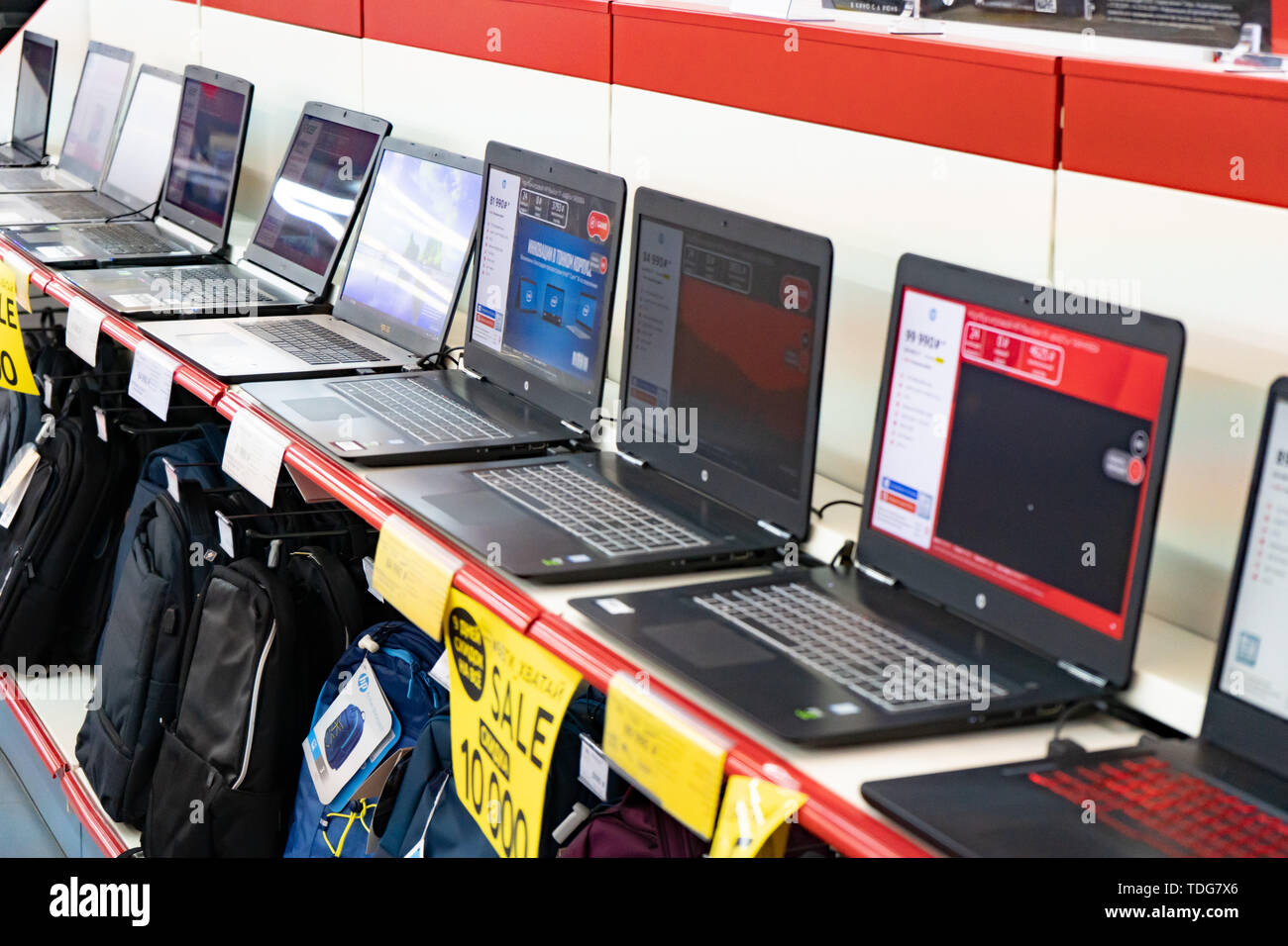 Chelyabinsk Region, Russia - June 2019. Household electrical appliances store M Video. Shelving with goods. Computers and laptops. Stock Photo