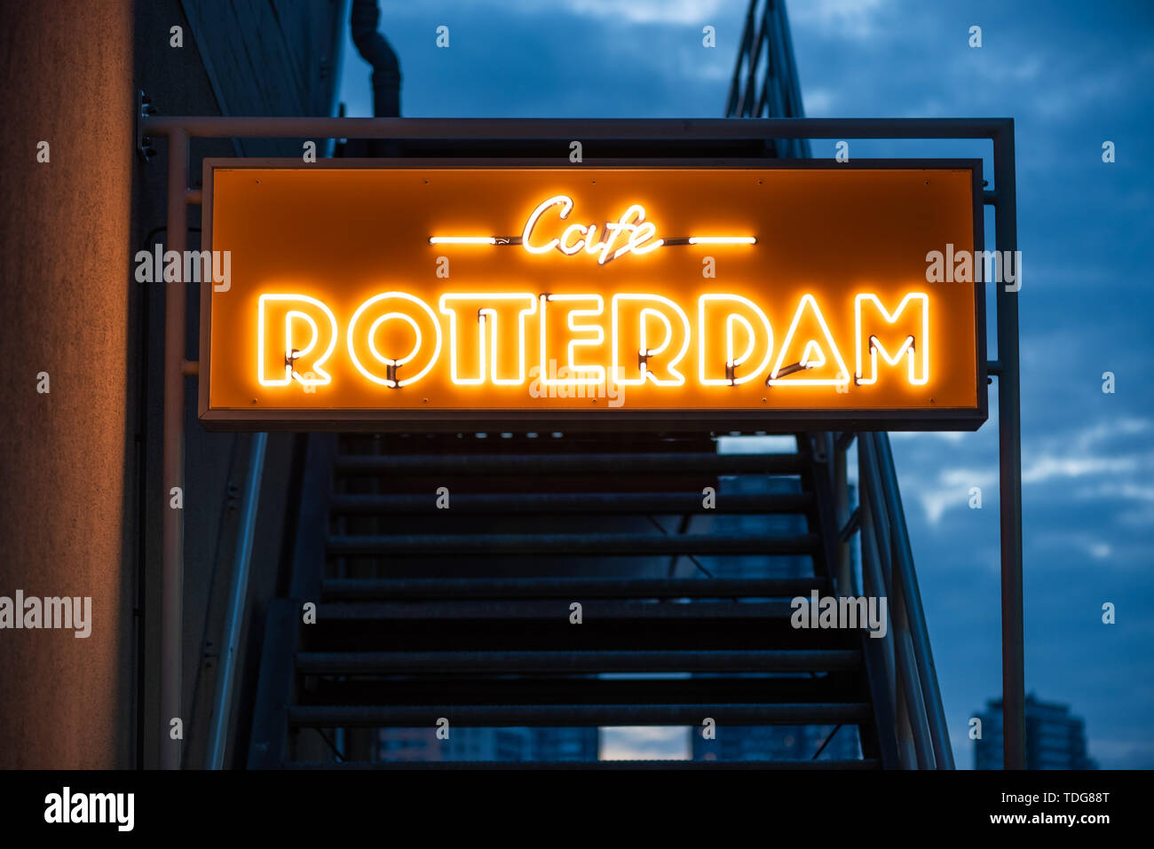 Rotterdam, Netherlands - May 5, 2019 : Cafe Rotterdam neon sign at dusk in the Cruise terminal area Stock Photo