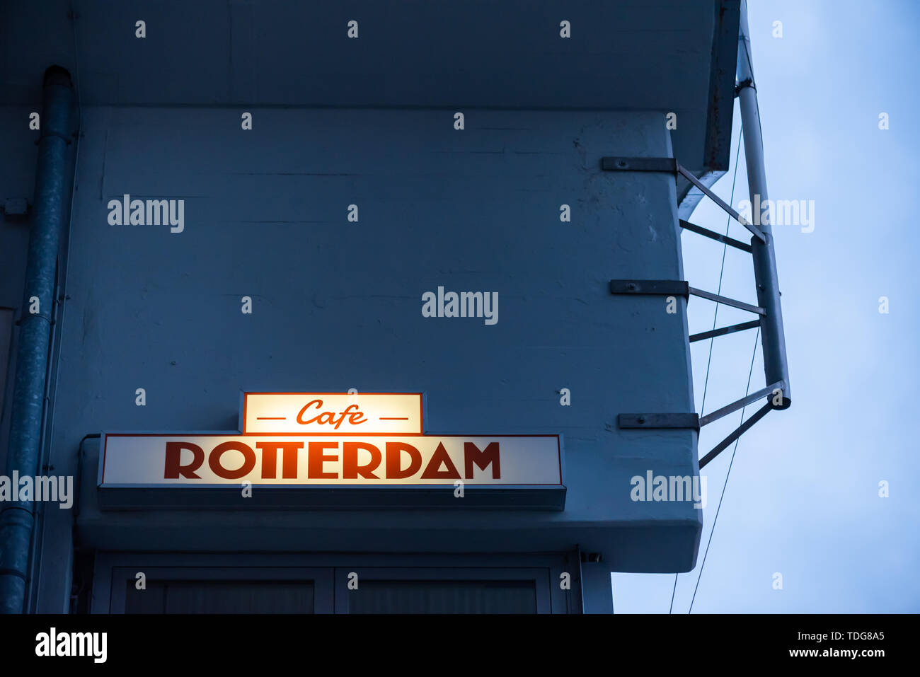 Rotterdam, Netherlands - May 5, 2019 : Cafe Rotterdam illuminated sign at dusk in the Cruise terminal area Stock Photo
