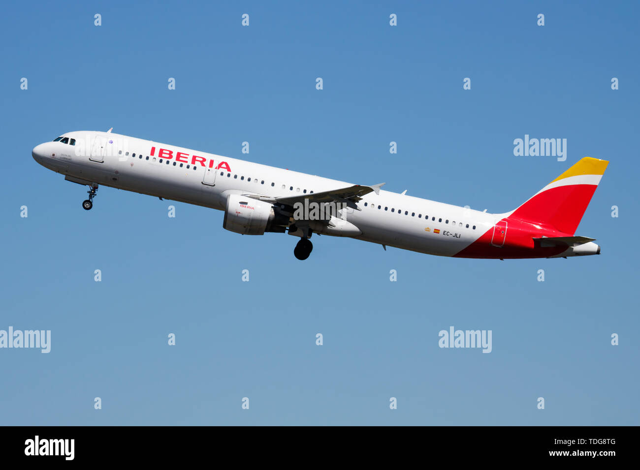 MADRID / SPAIN - MAY 1, 2016: Iberia Airlines Airbus A321 EC-JLI passenger plane departure at Madrid Barajas Airport Stock Photo