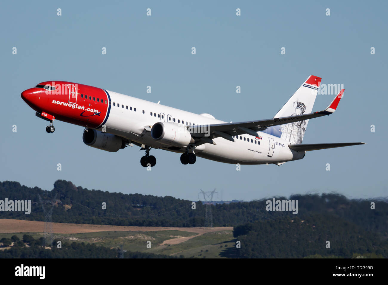 MADRID / SPAIN - MAY 1, 2016: Norwegian Air Shuttle Boeing 737-800 EI-FHG passenger plane deaparture at Madrid Barajas Airport Stock Photo
