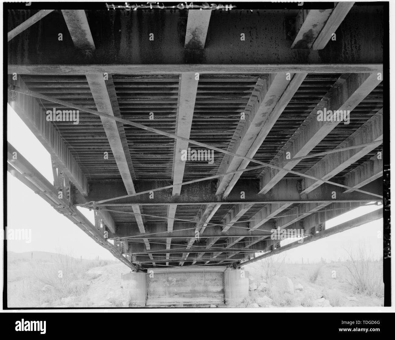 NORTH VIEW, UNDERSIDE OF BRIDGE, DETAIL OF IBEAM AND TENSION MEMBERS