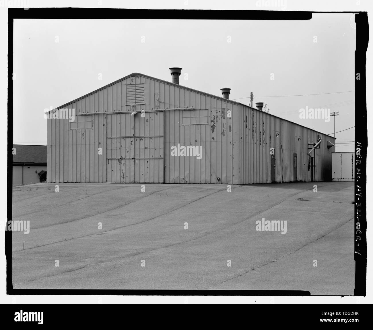 NORTHEAST (REAR) AND NORTHWEST (SIDE) ELEVATIONS OF BUILDING. VIEW TO ...