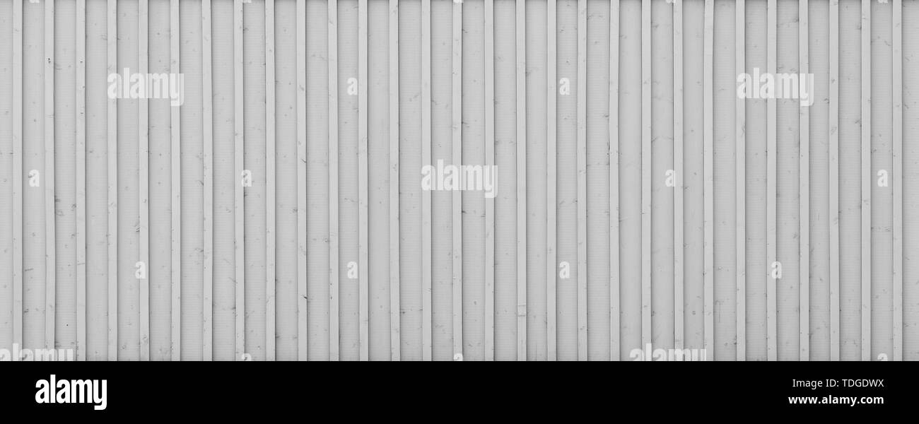 Full frame background of a new, clean and painted wood board wall painted in black and white. Stock Photo