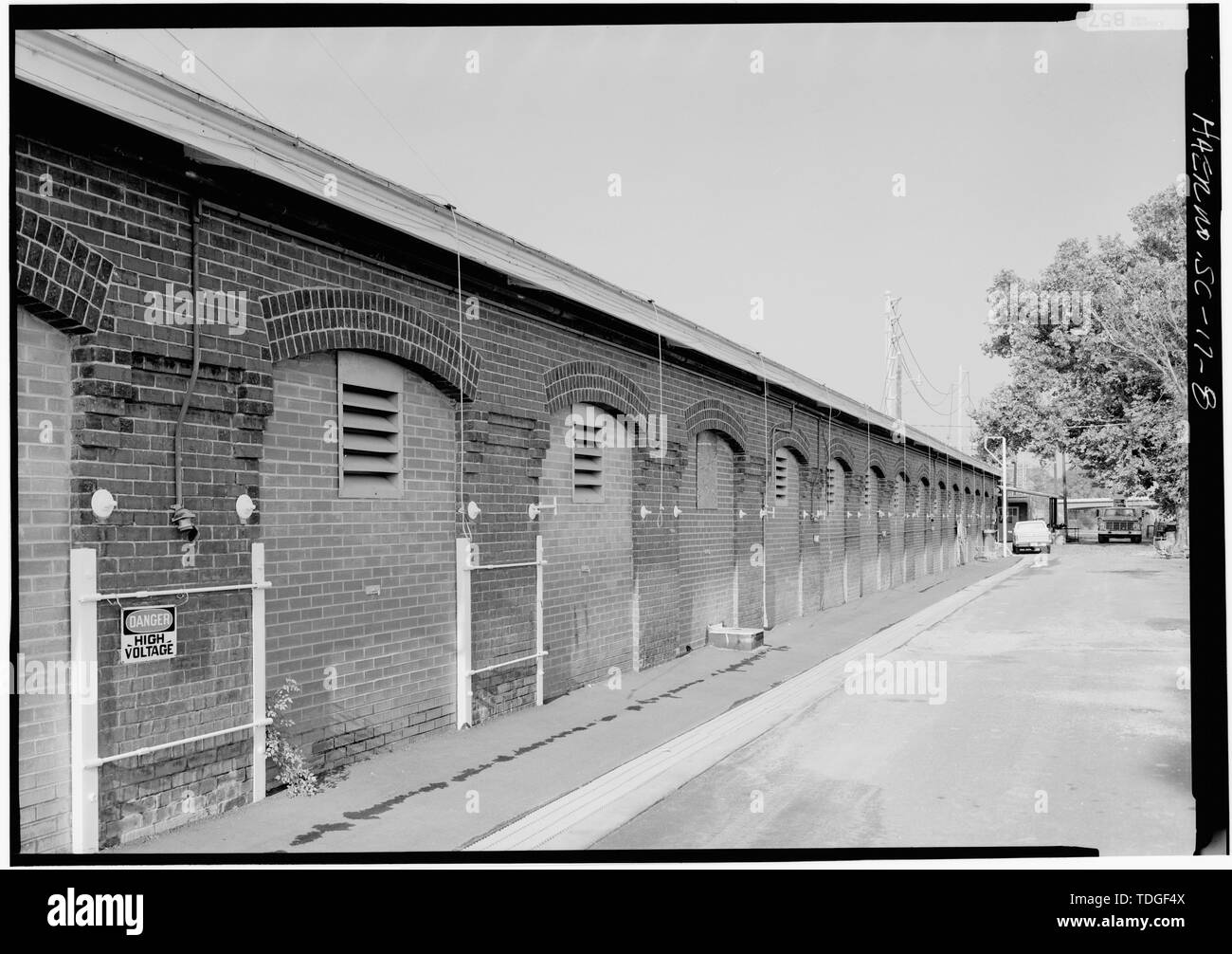 NORTHEAST SIDE ELEVATION, LOOKING NORTHWEST, CLOSER VIEW - Columbia Canal and Power Plant, Waterfront of Broad River, Columbia, Richland County, SC; Columbia Water Power Company; South Carolina Electric and Gas Company; Southern Railway; Cary, Brian, transmitter Stock Photo