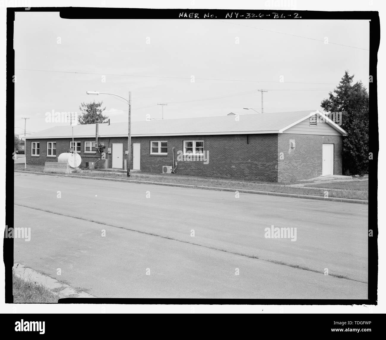 NORTHWEST (REAR) AND SOUTHWEST (SIDE) ELEVATIONS OF BUILDING view TO