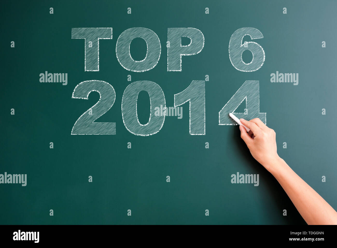 Top 6 2014 written on blackboard Stock Photo - Alamy