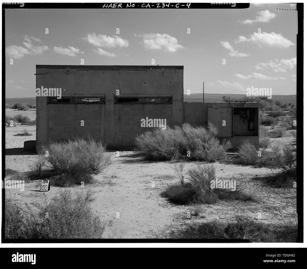 NORTHWEST FRONT, WITH FOUR BULLET GLASS WINDOWS. - Edwards Air Force Base, South Base Sled Track, Observation Block House, Station O area, east end of Sled Track, Lancaster, Los Angeles County, CA Stock Photo