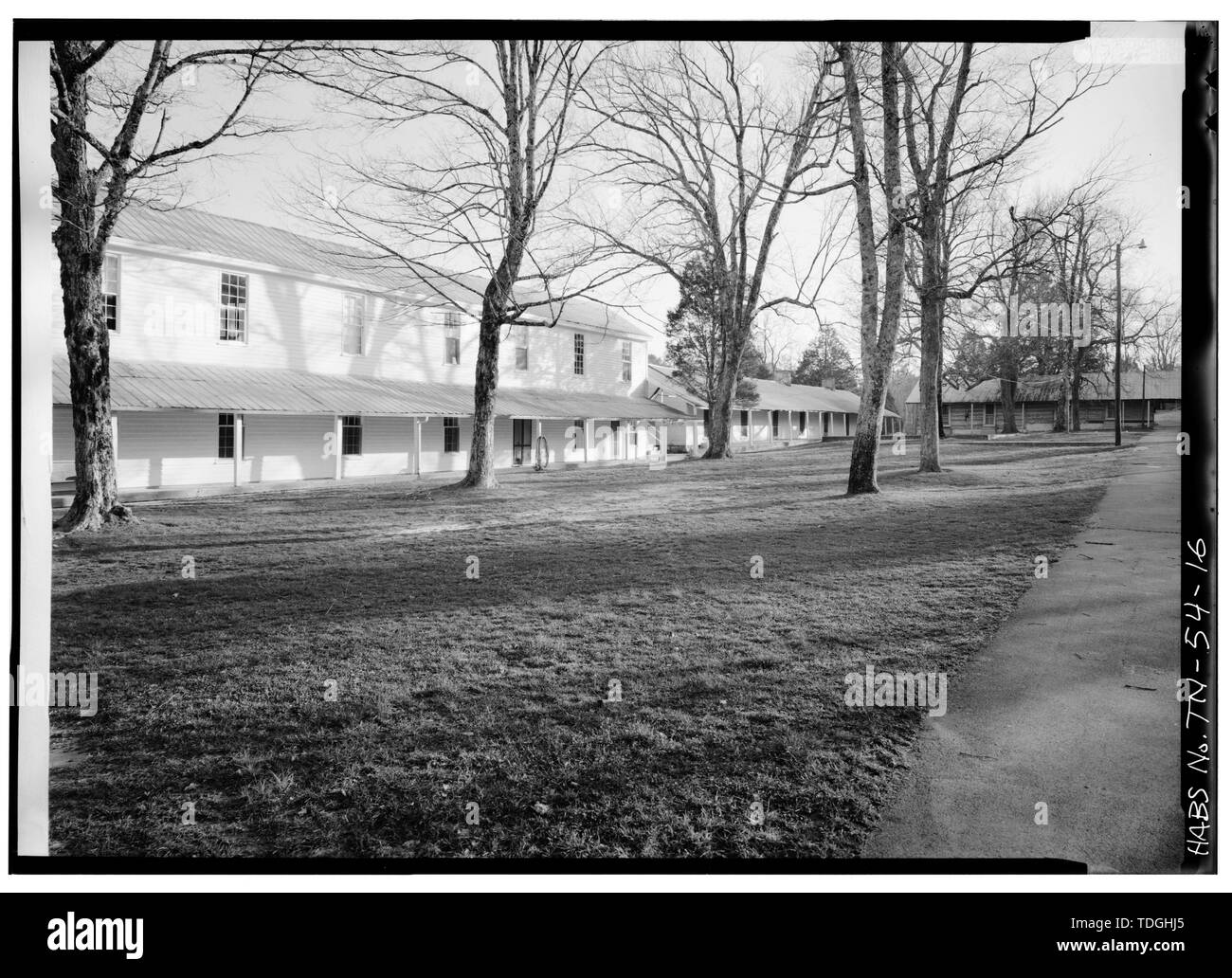 NORTHWEST SIDE OF WING OF MAIN BUILDING, ON SOUTHEAST SIDE OF COURT