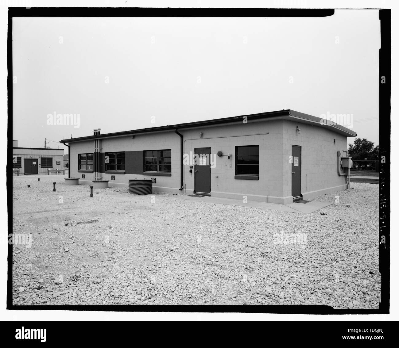 Northeast rear and northwest end, building no. 529. View to south