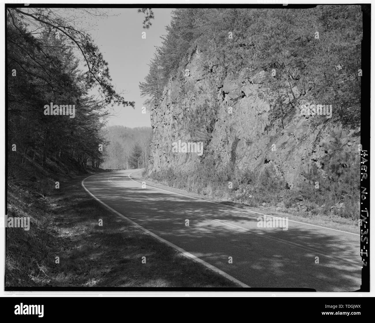 Northshore Road, view of rock cut along road. - Great Smoky Mountains National Park Roads and Bridges, Northshore Road, 1 mile spur at Fontana Dam and Bryson City to Noland Creek, Gatlinburg, Sevier County, TN; Bureau of Public Roads; Tennessee Valley Authority; US Army Corps of Engineers; E W Grannis Company; W B Dillard Construction Company; H F Ramsey Company; Fry, George; Udall, Stewart; Hartzog, George; Cowin and Company; Troitino and Brown Construction Company; Sasser, Jim; Helms, Jesse; Lupyak, Edward, field team project manager; Great Smoky Mountains National Park, sponsor; National Pa Stock Photo