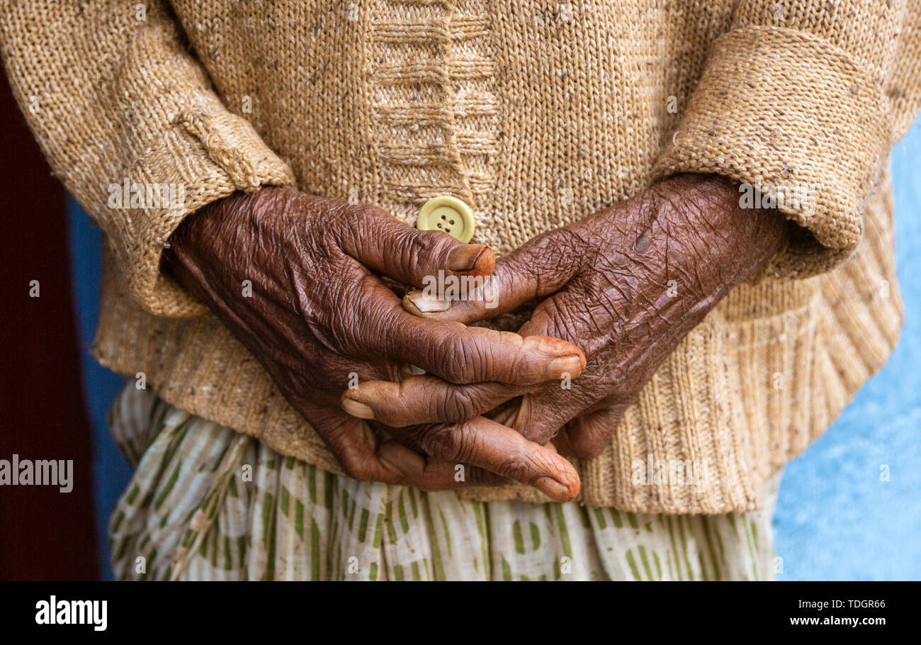 An Old Womans Hands Clasped and Relaxed Close-up. Stock Photo