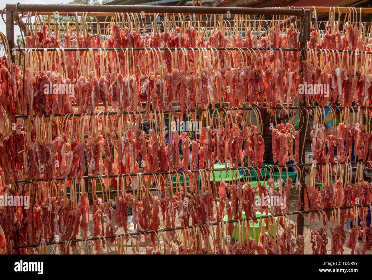 Beef Jerky Strips Hang On a Rack in the Sun Drying Stock Photo Alamy