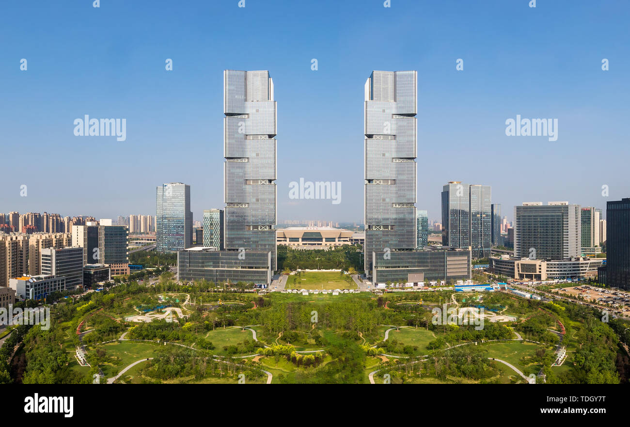 The surface building of the East High-speed Railway Station in Zhengzhou, the twin towers in the center of the green space. Stock Photo