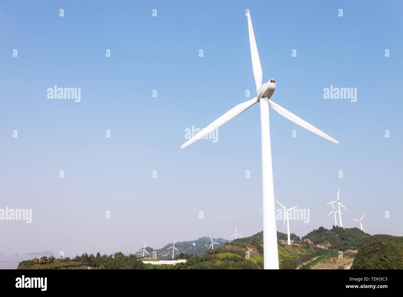 Wind Turbines with blue sky Stock Photo - Alamy