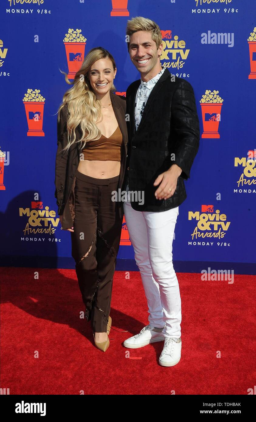Los Angeles, USA. 16th June 2019. Laura Perlongo and Nev Schulman attend the 2019 MTV Movie & TV Awards at Barker Hangar in Los Angeles, USA, on 15 June 2019. | usage worldwide Credit: dpa picture alliance/Alamy Live News Stock Photo