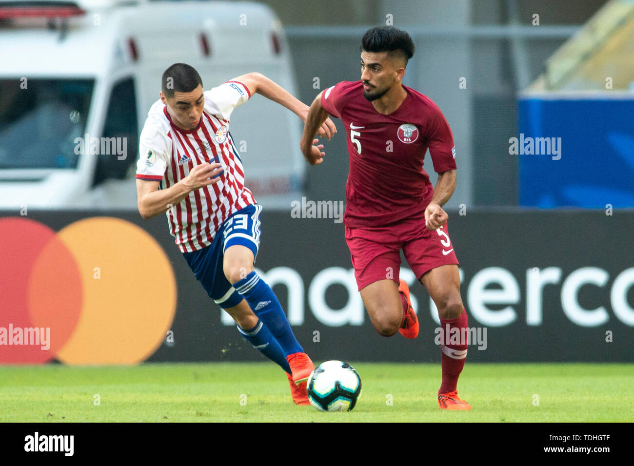 Rio De Janeiro, Brazil. 16th June, 2019. Tarek Salman (Meia) and M. Almirón  (Meia) during a match between Paraguay and Qatar, valid for the group stage  of the Copa América 2019, held