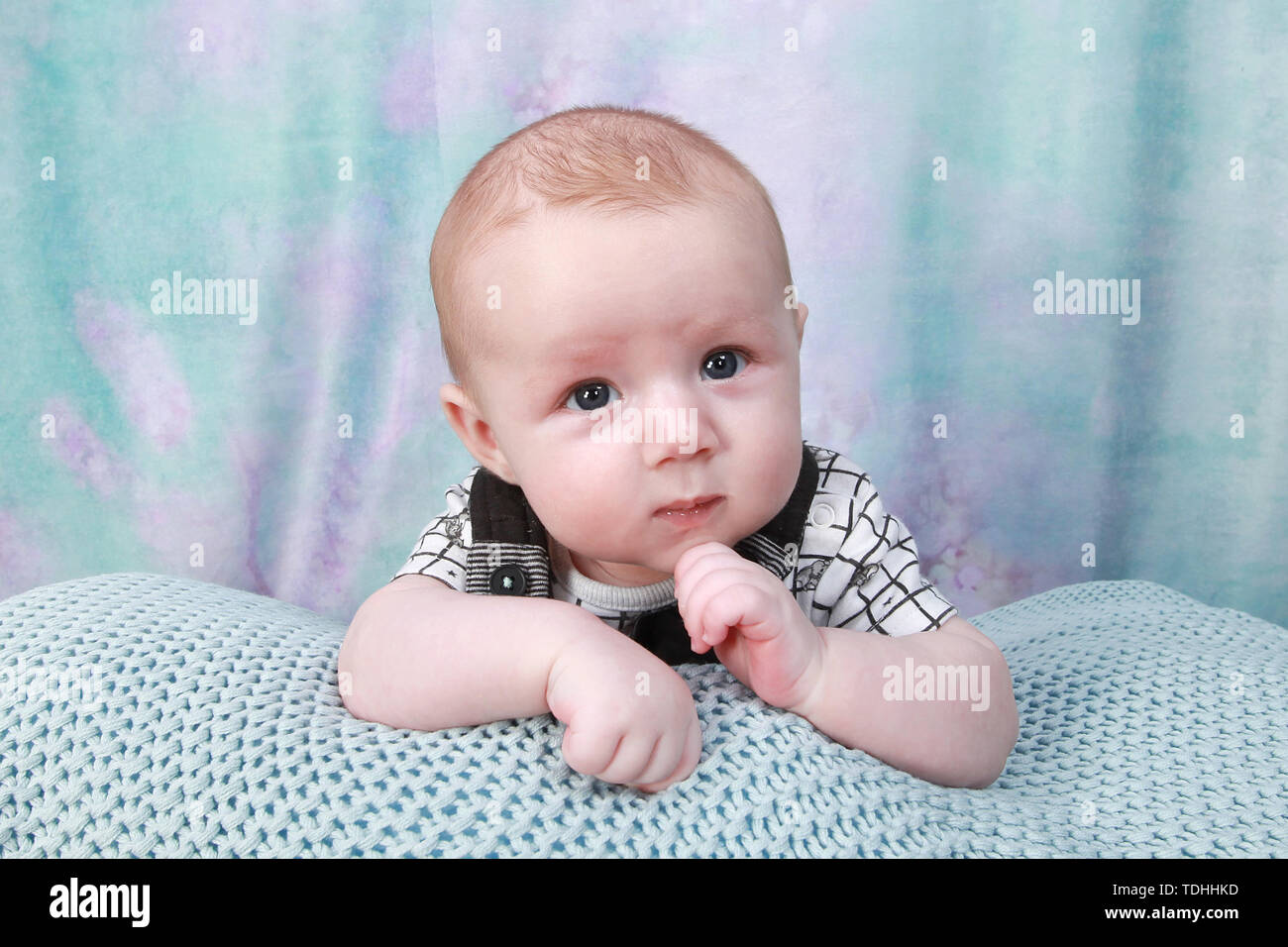 3 month old baby boy relaxing Stock Photo Alamy