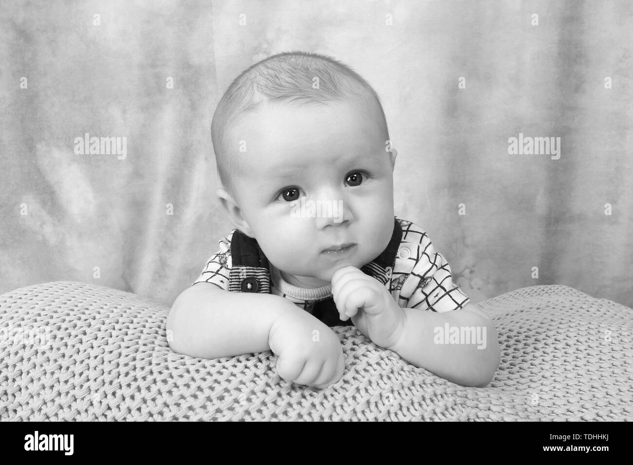 3 month old baby boy relaxing Stock Photo