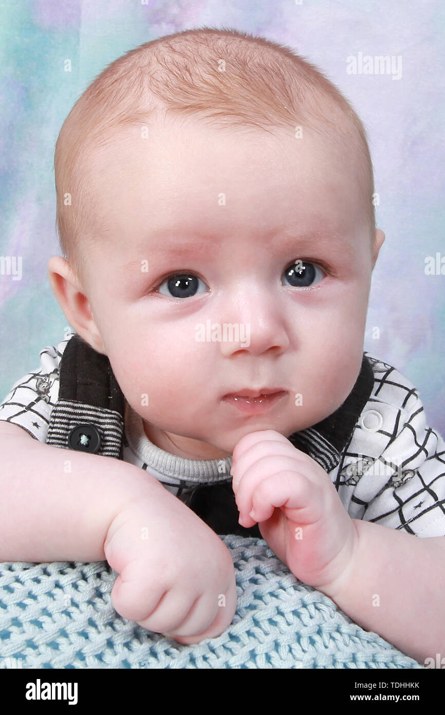 3 month old baby boy relaxing Stock Photo Alamy