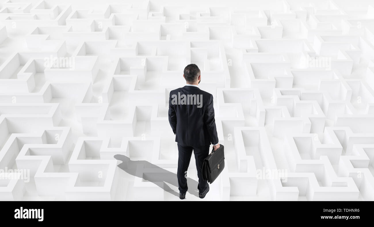 Man in the maze hi-res stock photography and images - Alamy