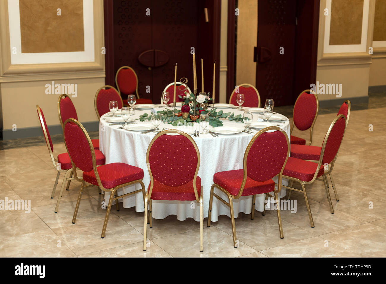 The Wedding Table Setting Is Decorated With Fresh Flowers In A