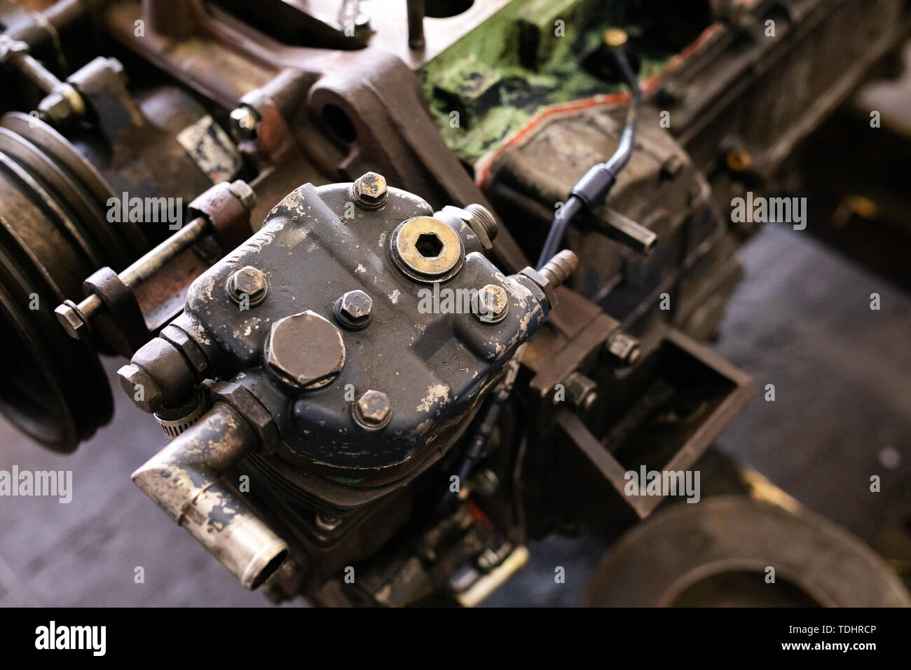 Mechanic opened the locking valve mechanism. Disassemble engine block ...