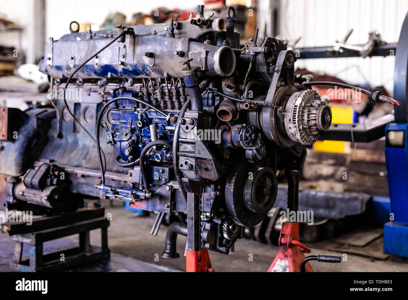 Mechanic opened the locking valve mechanism. Disassemble engine block ...