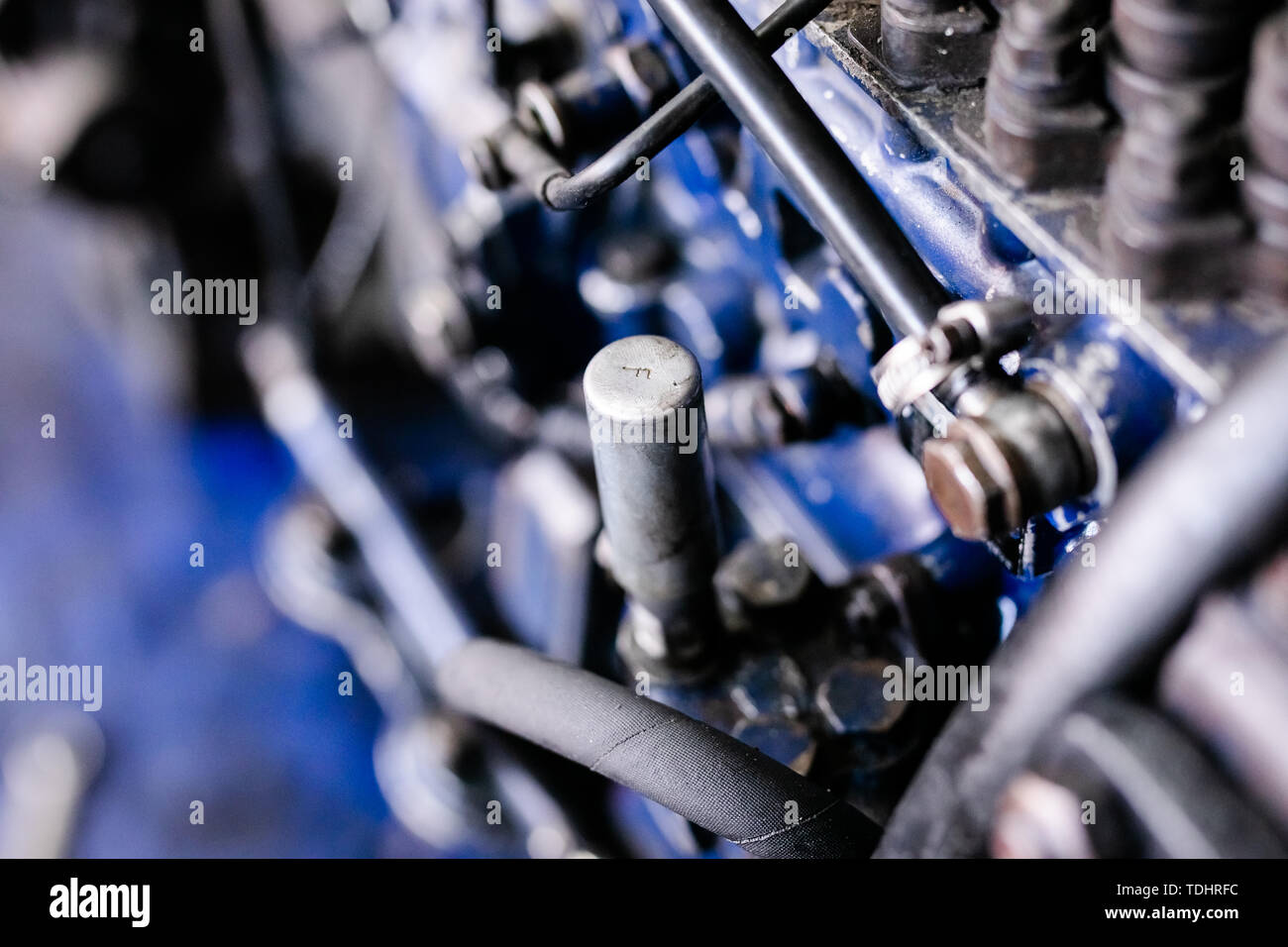 Mechanic opened the locking valve mechanism. Disassemble engine block ...