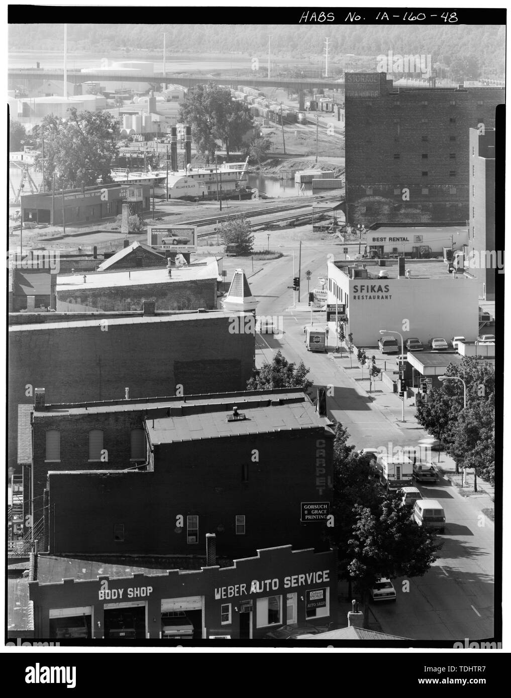 OVERALL VIEW OF COMMERCIAL-INDUSTRIAL DISTRICT, SHOWING BUILDINGS ON 400 BLOCK OF CENTRAL AVENUE. VIEW TO SOUTH. - Dubuque Commercial and Industrial Buildings, Dubuque, Dubuque County, IA; Dubuque Commercial and Industrial Buildings − HABS documentation project — in Dubuque, Iowa.  Image (1988): HABS—Historic American Buildings Survey of Iowa. Stock Photo
