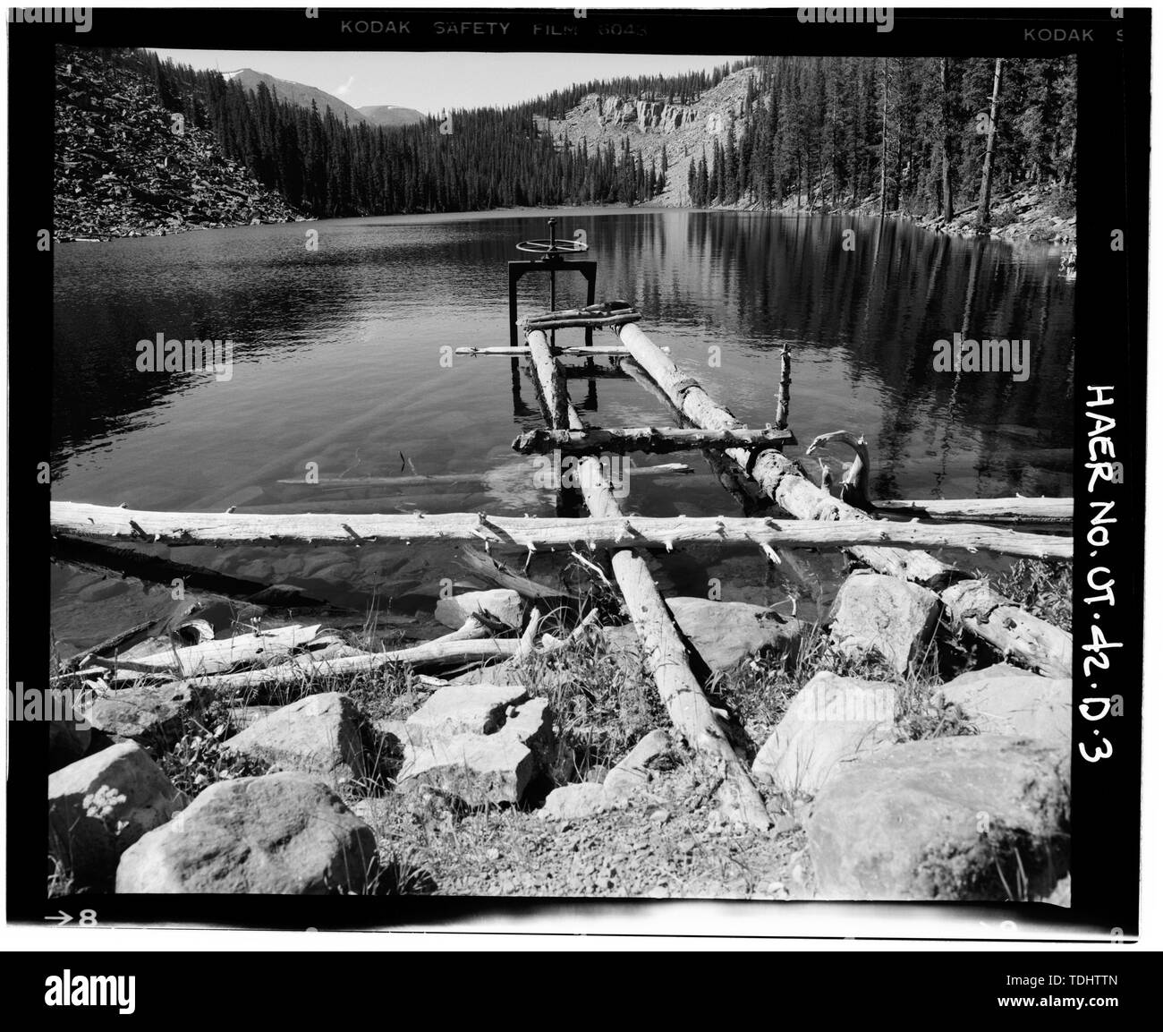 OVERALL VIEW OF DEER LAKE AND UPRIGHT OUTLET GATE WHEEL, STEM AND STEM  GUIDE, LOOKING NORTH - High Mountain Dams in Upalco Unit, Deer Lake Dam,  Ashley National Forest, 5.8 miles North