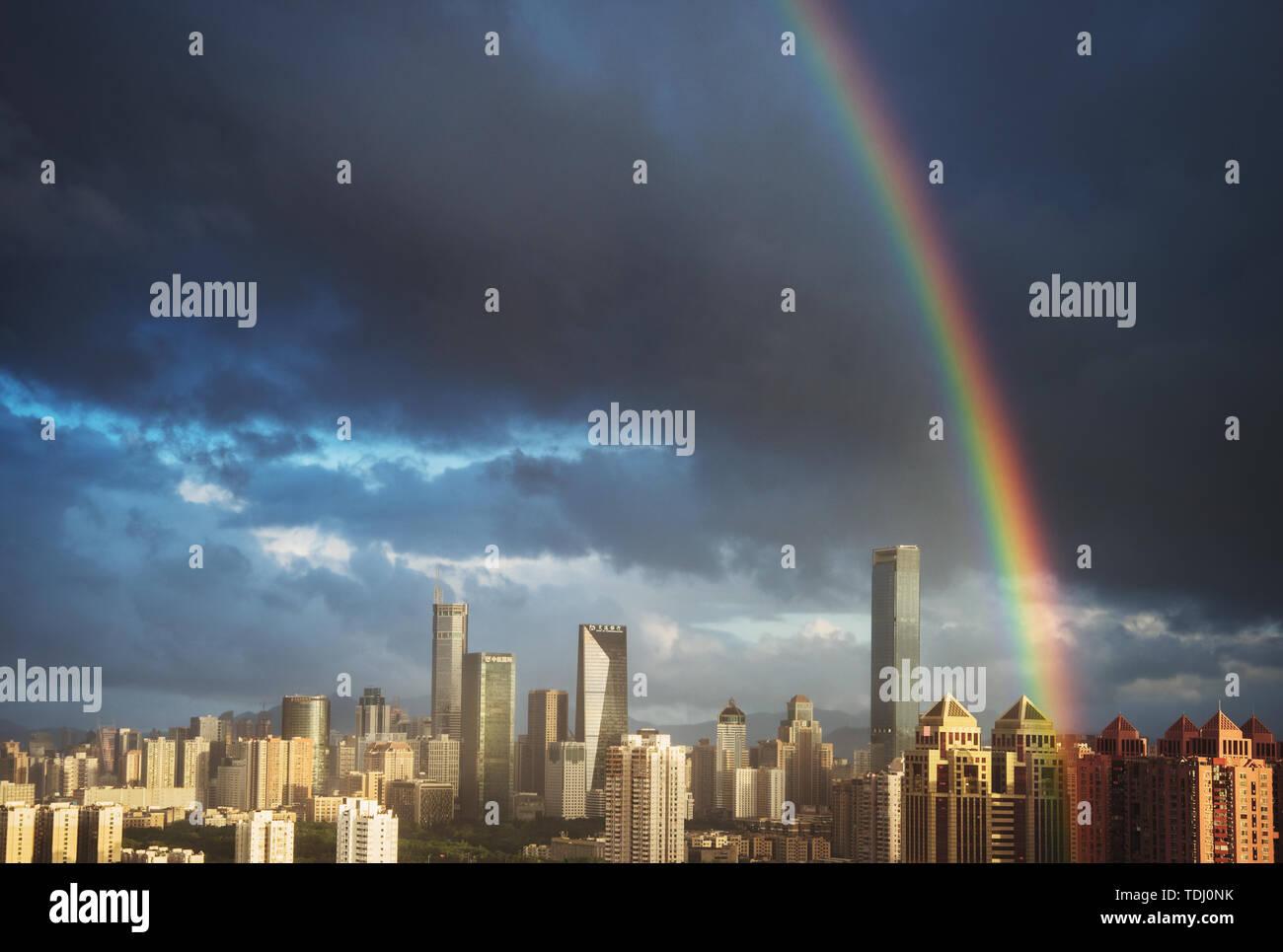 Shenzhen Futian cbd building blue sky white clouds sunshine rainbow ...