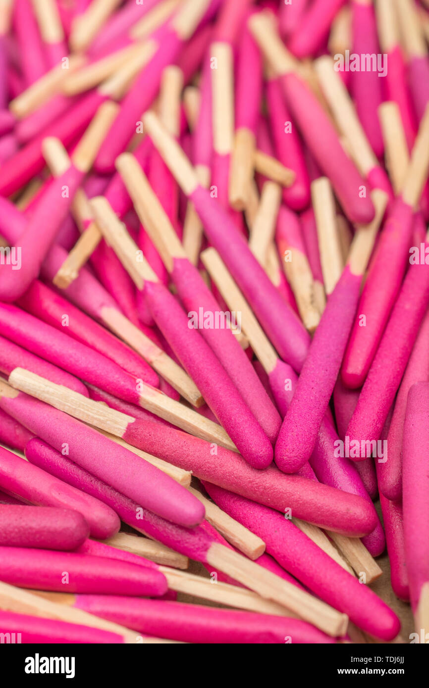 Macro close-up random pile of waterproof emergency matches. Metaphor survival skills, chaotic mind, disorganized, random, macro close-up matches. Stock Photo